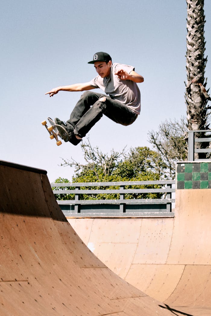 Person Skating on Skateboard Ramp
